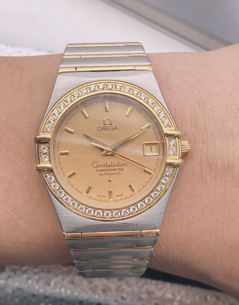 二手95新欧米茄18k金后钻手表价格,值多少钱?